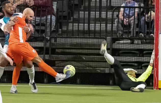 Florida Tropics forward Rafa Araujo scores against the St. Louis Ambush