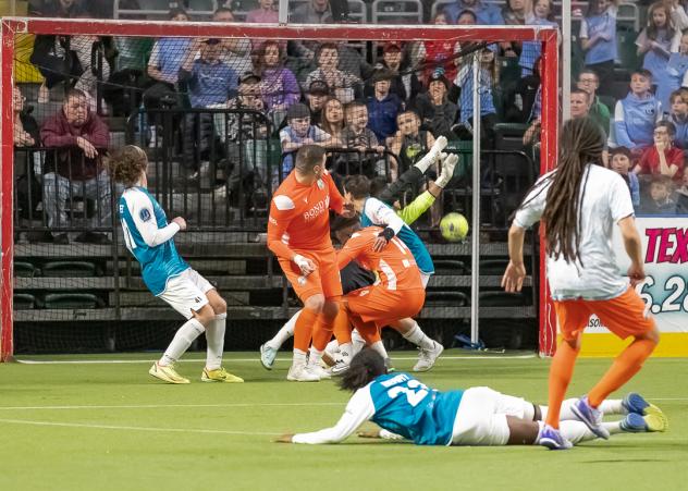 Drew Ruggles of the Florida Tropics scores against the St. Louis Ambush