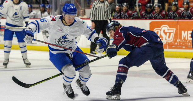 Wichita Thunder forward Timur Ibragimov (left) vs. the Tulsa Oilers