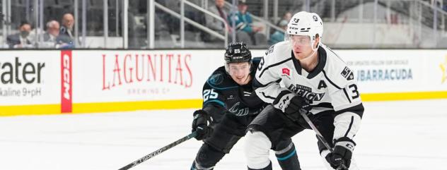 San Jose Barracuda's Artemi Kniazev battles Ontario Reign's Tobias Bjornfot