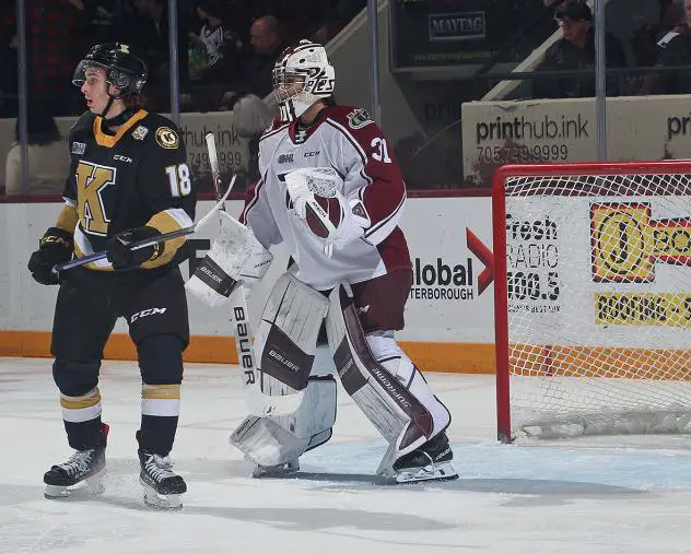 Kingston Frontenacs' Gabriel Frasca and Peterborough Petes' Michael Simpson on game night