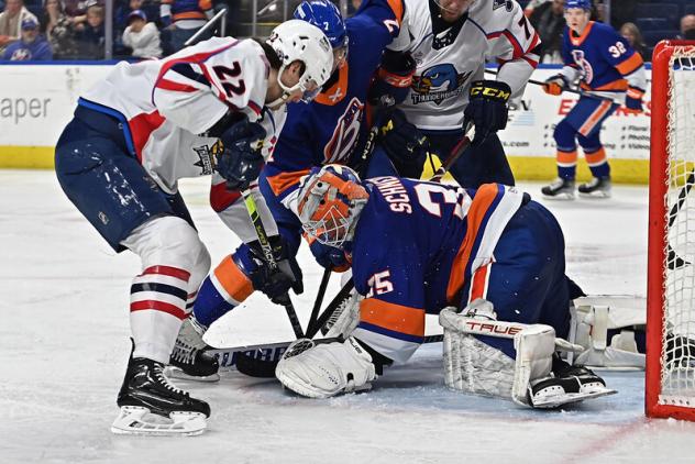 Springfield Thunderbirds' Greg Printz battles Bridgeport Islanders' Cory Schneider