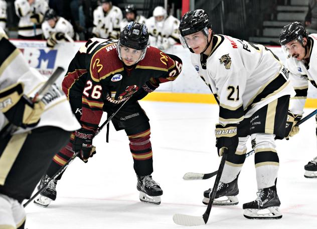 Bismarck Bobcats forward Julian Beaumont (right) vs. the Minot Minotauros