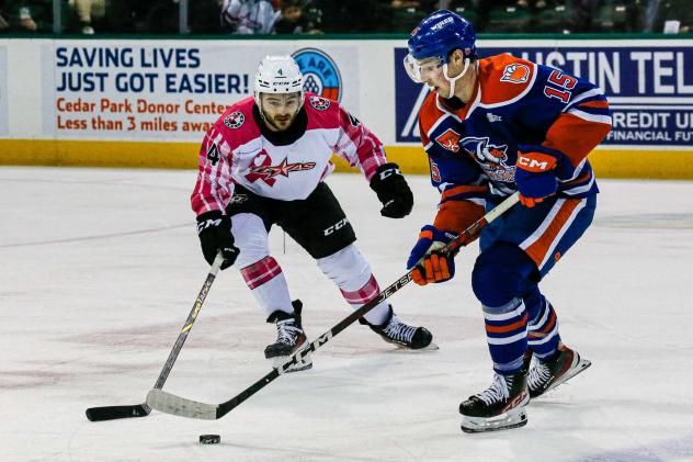 Texas Stars' Will Butcher and Bakersfield Condors'Noah Philp in action