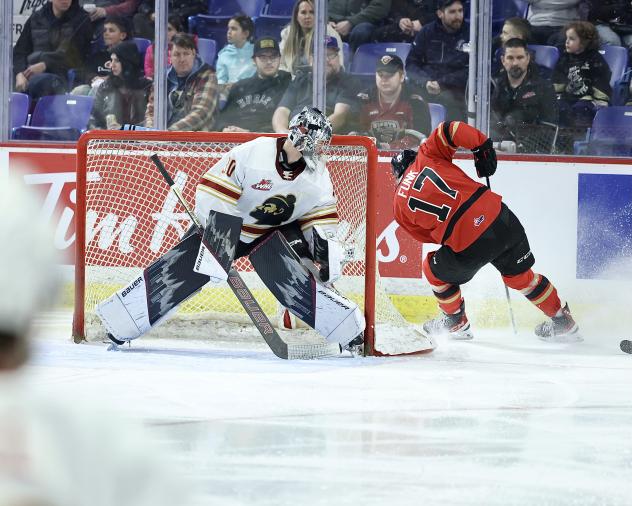 Vancouver Giants' Jesper Vikman battles Prince George Cougars' Zac Funk