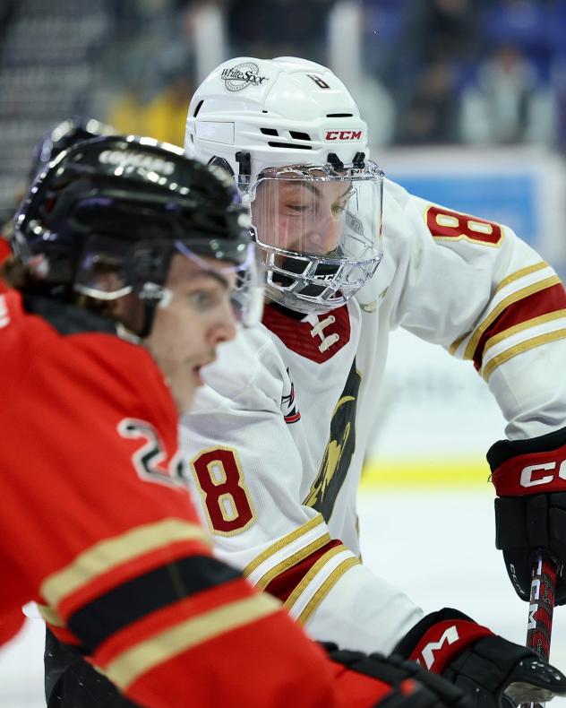 Vancouver Giants' Ty Thorpe and Prince George Cougars' Keaton Dowhaniuk
