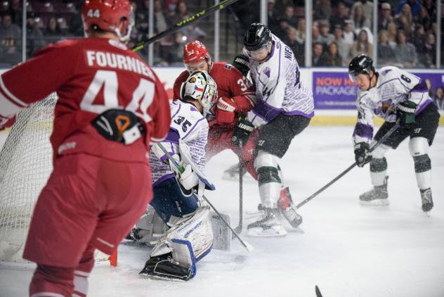 Allen Americans right wings Stefan Fournier and Mikael Robidoux pressure the Utah Grizzlies