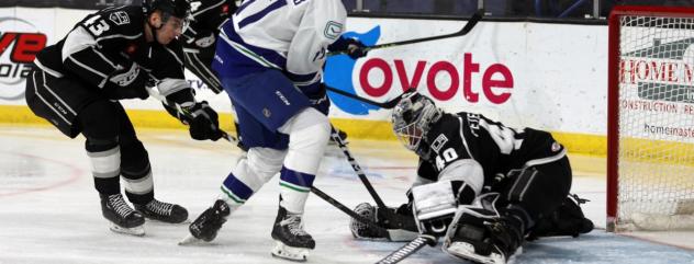 Ontario Reign's Cal Petersen and Jacob Moverare in action