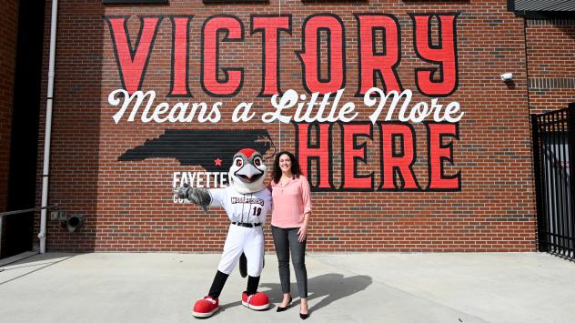 Fayetteville Woodpeckers General Manager Michelle Skinner and mascot Bunker