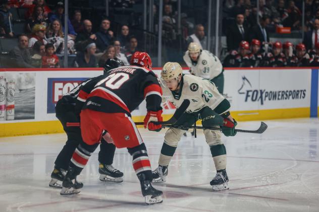 Grand Rapids Griffins' Riley Sawchuk versus Iowa Wild's Marco Rossi