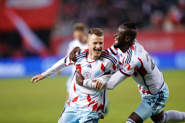 Chicago Fire FC's Fabian Herbers and Kei Kamara