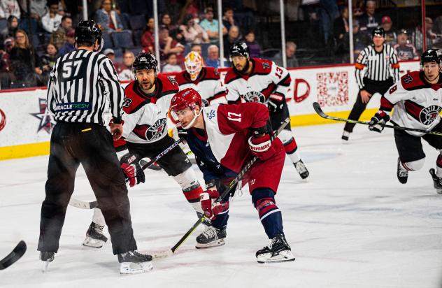 Chad Butcher of the Allen Americans faces off with the Rapid City Rush