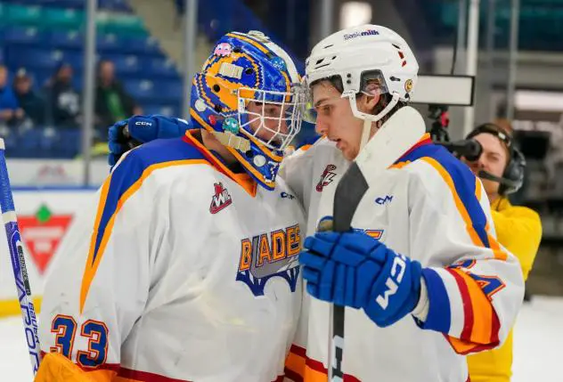 Saskatoon Blades' Ethan Chadwick and Tanner Molendyk