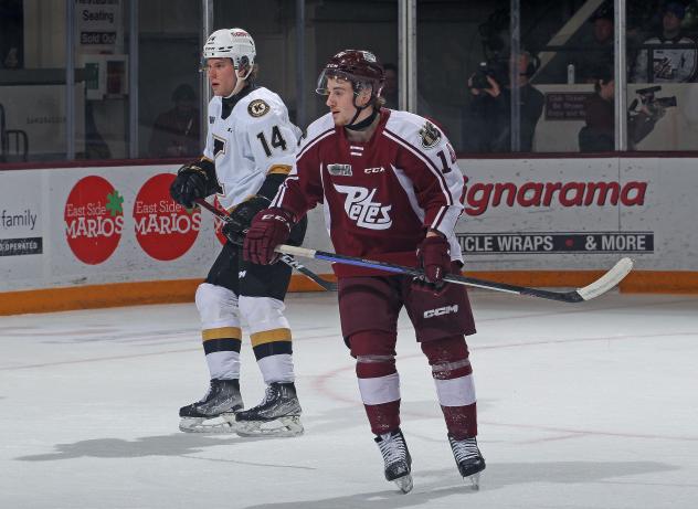 Kingston Frontenacs' Ian Lemieux and Peterborough Petes' Liam Kirk on game night