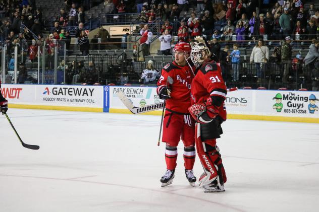 Rapid City Rush's Simon Lavigne and Adam Carlson on game night