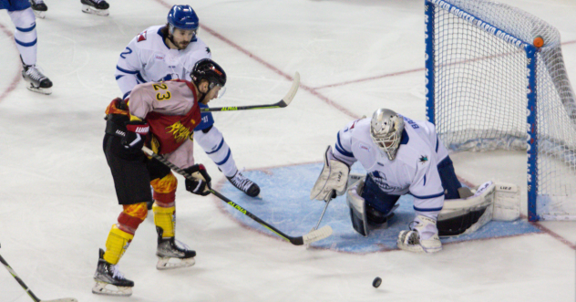 Rapid City Rush's Brett Gravelle battles Wichita Thunder's Roman Basran