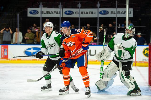 Bakersfield Condors' Noah Philp and Texas Stars' Oskari Laaksonen and Remi Poirier on the ice