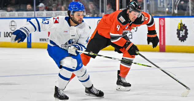 Wichita Thunder forward Quinn Preston (left) vs. the Kansas City Mavericks