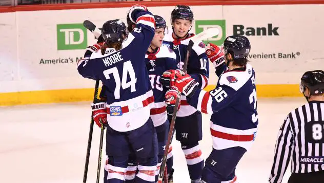 South Carolina Stingrays' Connor Moore, Lawton Courtnall and Michael Kim celebrate win