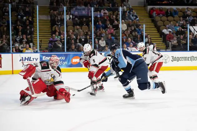 Grand Rapids Griffins' Alex Nedeljkovic and Eemil Viro versus Milwaukee Admirals' Joakim Kemell