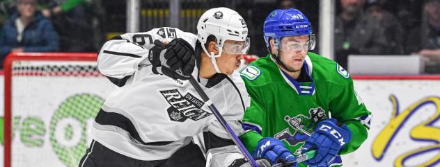 Ontario Reign's Andre Lee versus Abbotsford Canucks' Danila Klimovich