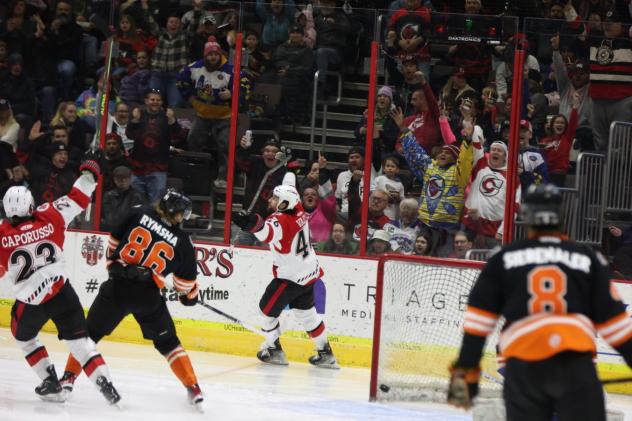 The Cincinnati Cyclones celebrate Justin Vaive's goal against the Fort Wayne Komets