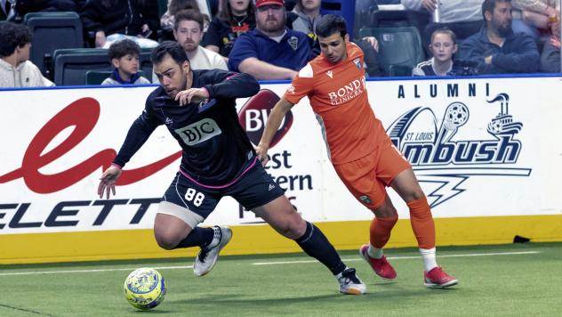 St. Louis Ambush forward Duduca Carvalho (left) vs. the Florida Tropics