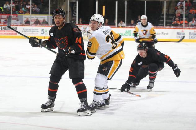 Lehigh Valley Phantoms' Zayde Wisdom and Ronnie Attard versus Wilkes-Barre/Scranton Penguins' Kyle Olson