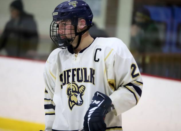 Defenseman Billy Roche with Suffolk University