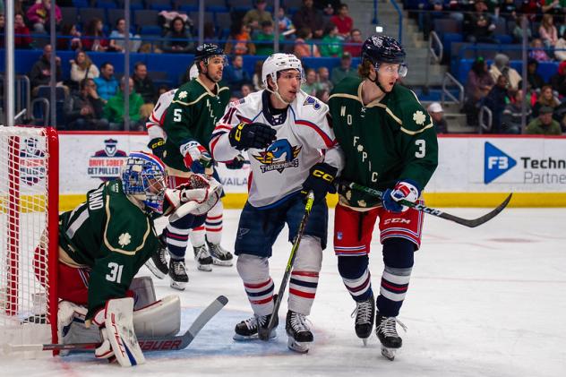 Springfield Thunderbirds right wing Will Bitten sets up in front of the net