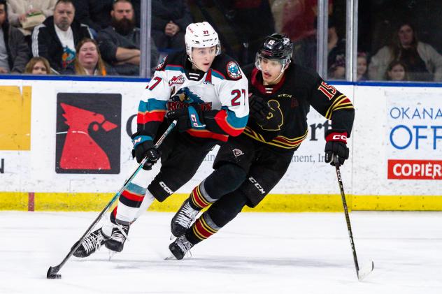 Kelowna Rockets defenceman Jackson DeSouza (left) vs. the Vancouver Giants