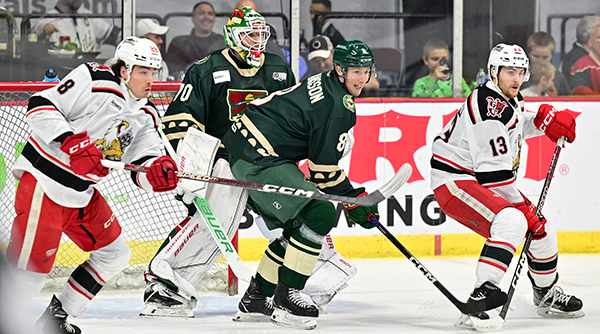 Grand Rapids Griffins set up in front of Iowa Wild goaltender Zane McIntyre