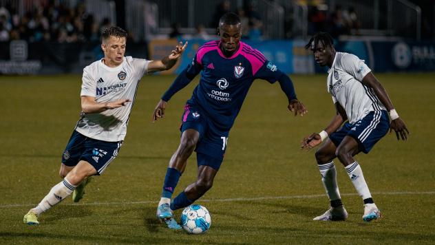 South Georgia Tormenta FC's Andrew Akindele versus Charlotte Independence's Brad Dunwell and Avionne Flanagan
