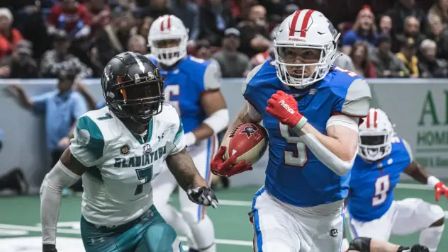 Northern Arizona Wranglers running back Jarrod Ware Jr. picks up yardage vs. the Duke City Gladiators