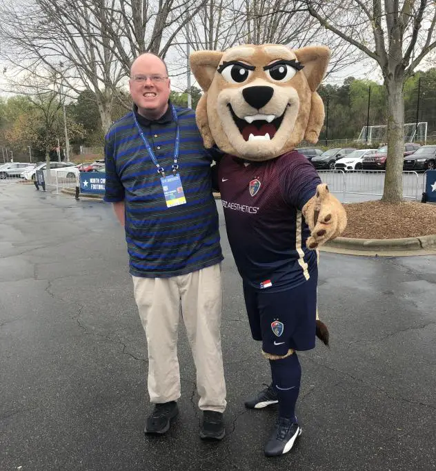 Writer Fran Stuchbury and North Carolina Courage mascot Roary