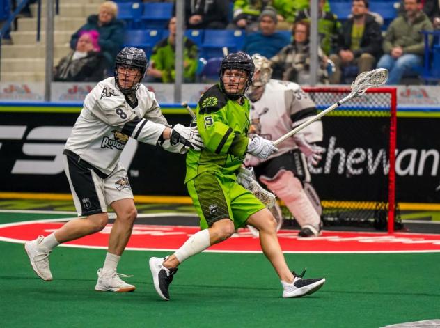Calgary Roughnecks' Kieran McKay versus Saskatchewan Rush's Ryan Keenan
