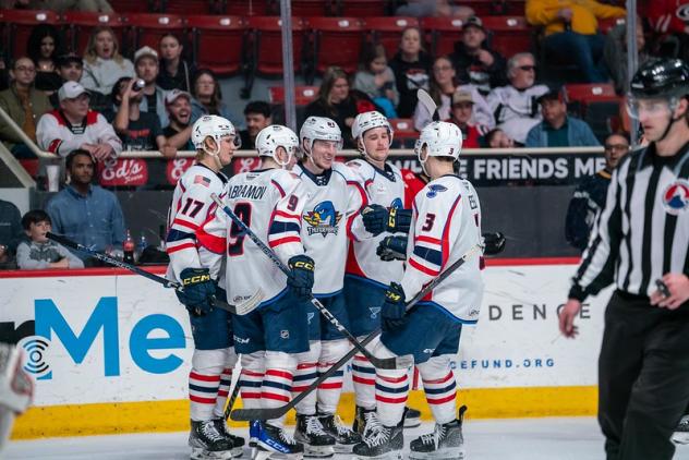 Springfield Thunderbirds' Nikita Alexandrov, Mikhail Abramov and Matt Kessel celebrate win