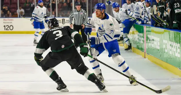Utah Grizzlies' Cory Thomas and Wichita Thunder's Jay Dickman in action