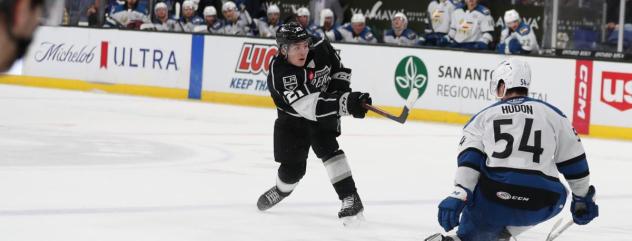 Ontario Reign's Jordan Spence and Colorado Eagles' Charles Hudon on game night