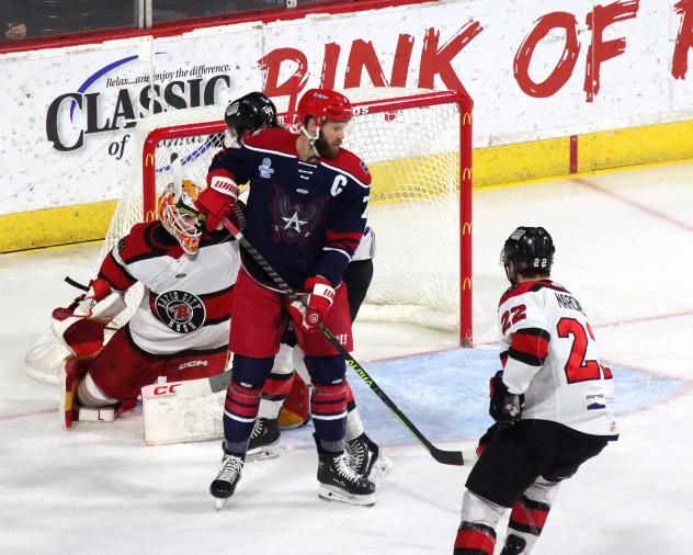 Allen Americans center Colton Hargrove sets up in front of the Rapid City Rush net