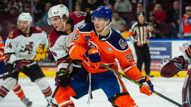 Tucson Roadrunners' Michael Kesselring battles Bakersfield Condors' Dylan Holloway