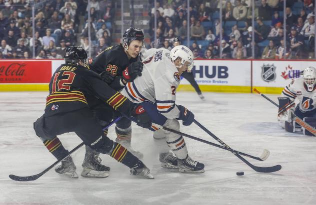 Vancouver Giants centre Connor Dale (left) and right wing Tyler Thorpe vs. the Kamloops Blazers