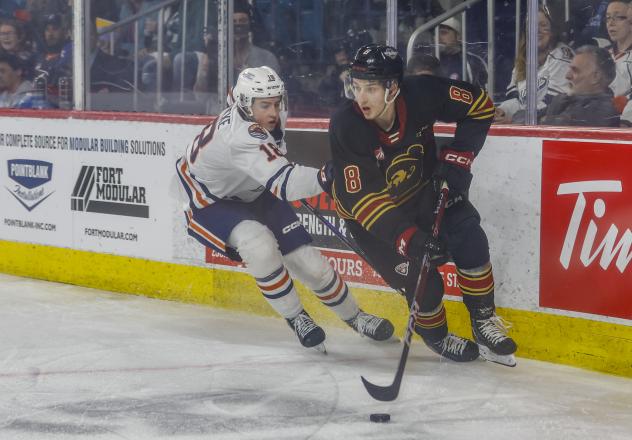 Vancouver Giants centre Ty Thorpe with the puck vs. the Kamloops Blazers