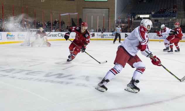 Allen Americans left wing Jack Combs (right) vs. the Rapid City Rush