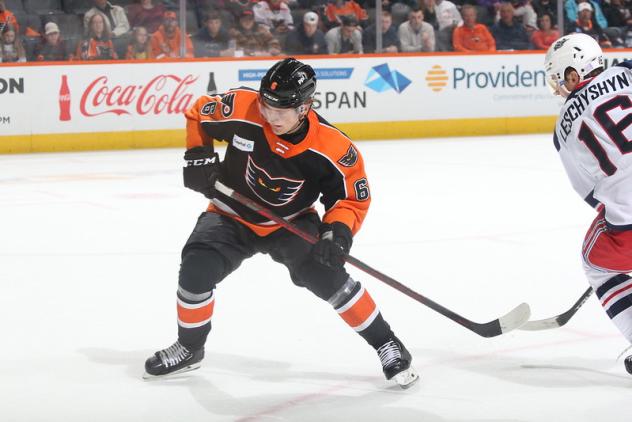 Lehigh Valley Phantoms' Linus Hogberg and Hartford Wolf Pack's Jake Leschyshyn in action