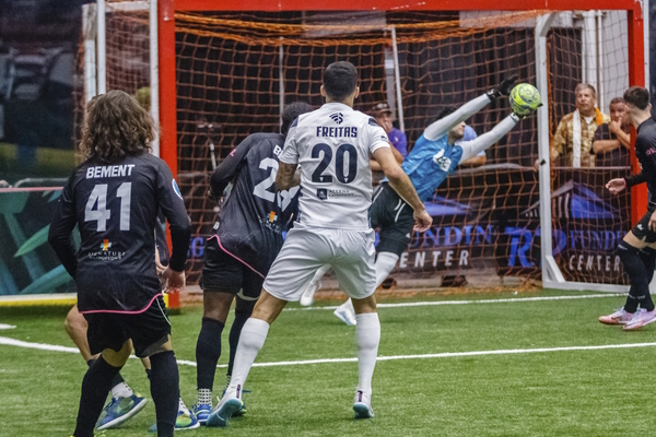St. Louis Ambush's Brian Bement and Florida Tropics' Thiago Freitas on the field