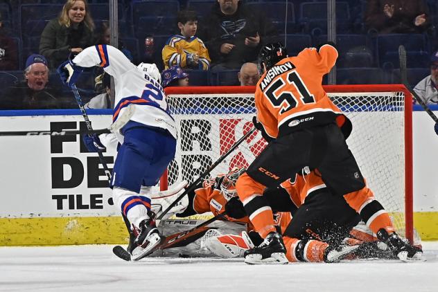 Bridgeport Islanders' Cole Bardreau and Lehigh Valley Phantoms' Artem Anisimov in action