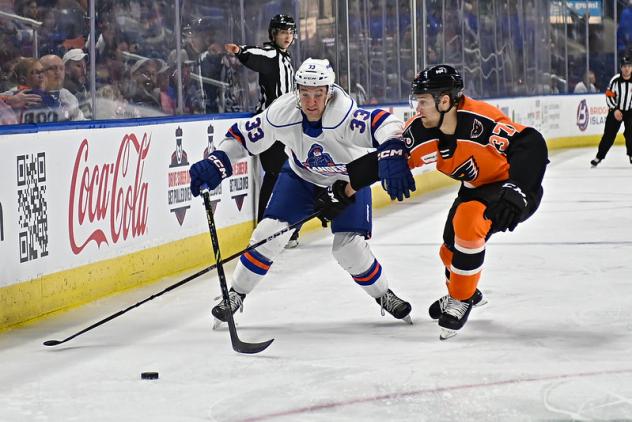 Bridgeport Islanders' Reece Newkirk battles Lehigh Valley Phantoms' Adam Ginning