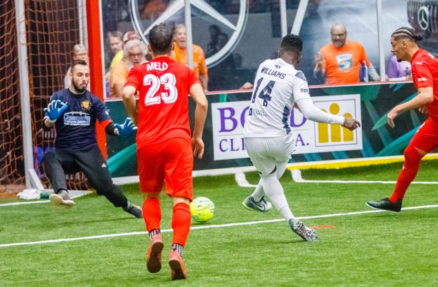 Kiel Williams of the Florida Tropics shoots against Baltimore Blast goaltender William Vanzela