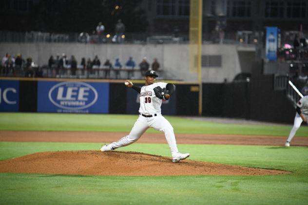 Fayetteville Woodpeckers' Alimber Santa in action